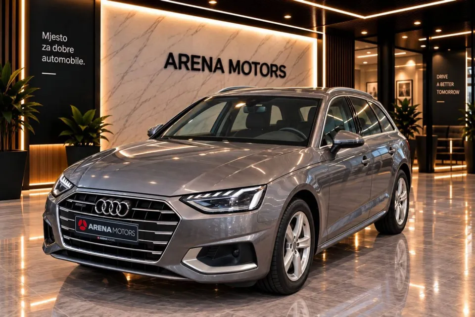 Audi A4 Avant, siva boja, pogled sprijeda i sa strane u izložbenom prostoru salona