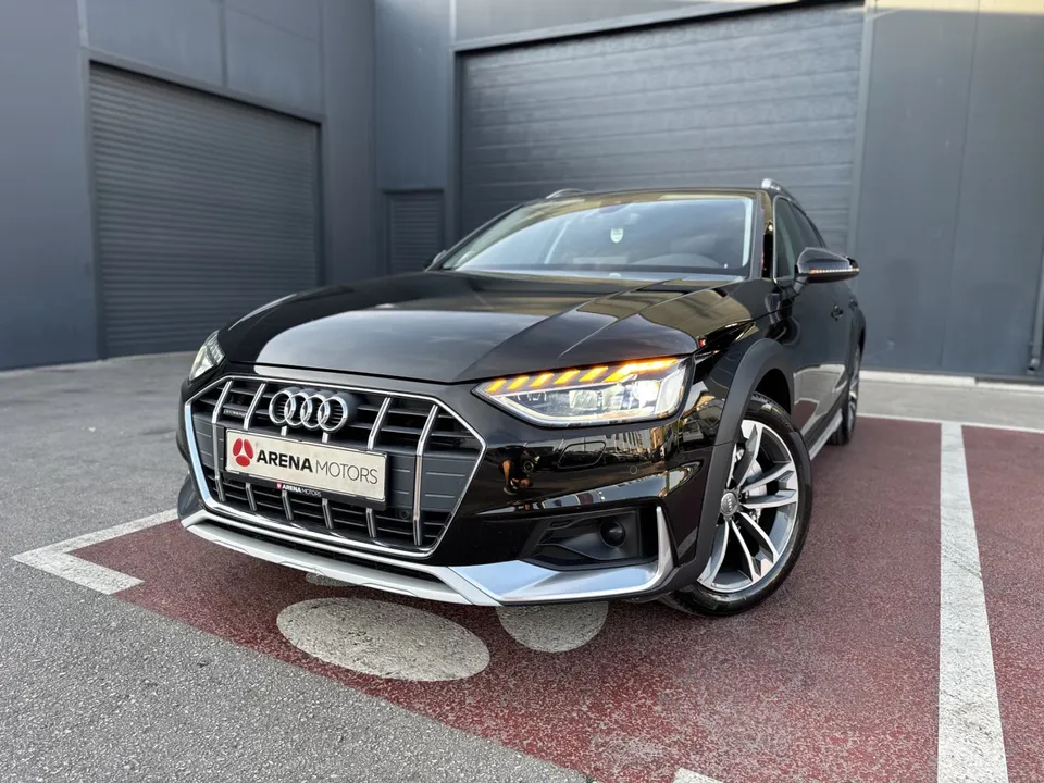 Audi A4 Allroad, crna boja, prednji lijevi ugao s upaljenim LED svjetlima