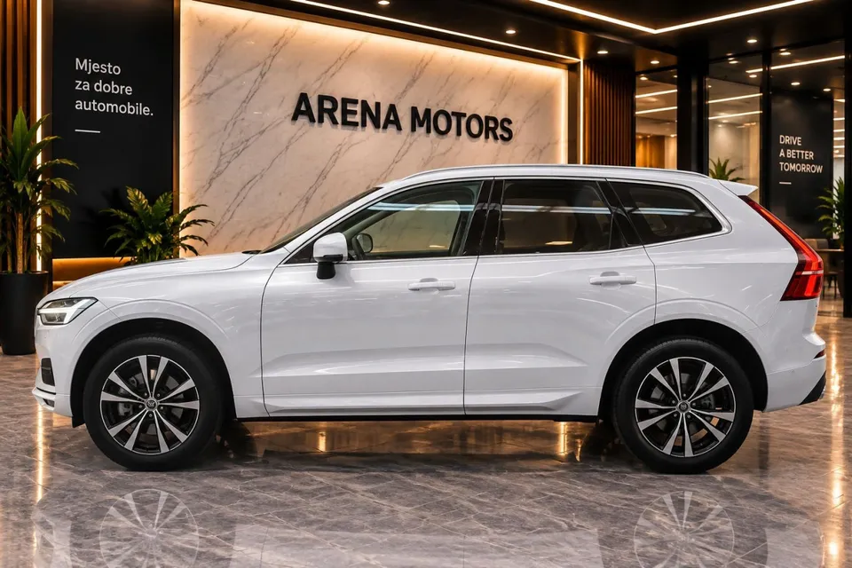 Bijeli Volvo XC60 u profilu, lijeva strana, s alu felgama